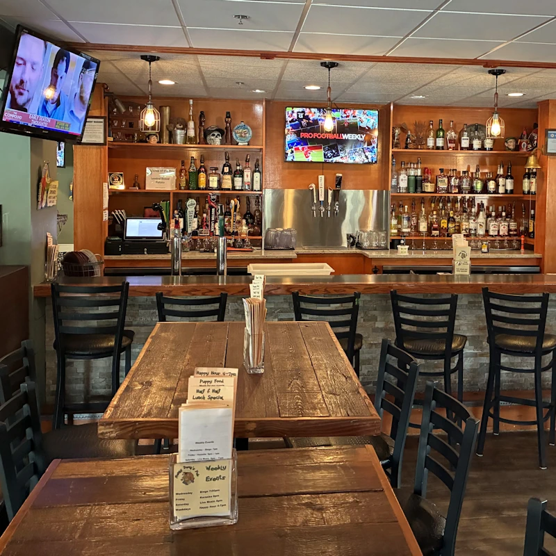 Wood bar top at Mangy Dawg