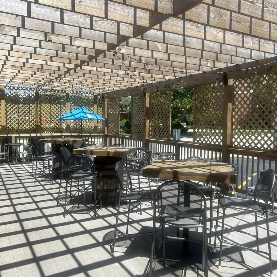 Outdoor patio seating at Mangy Dawg